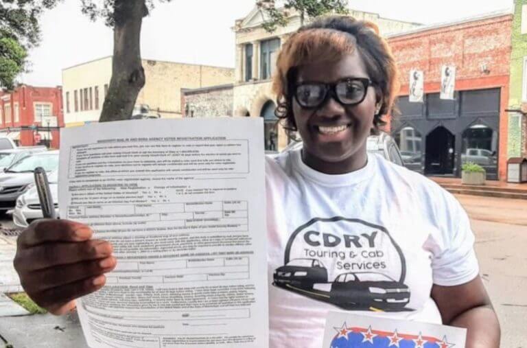 Upset with elected officials after COVID-19 halted her business, Delta woman registers people to vote