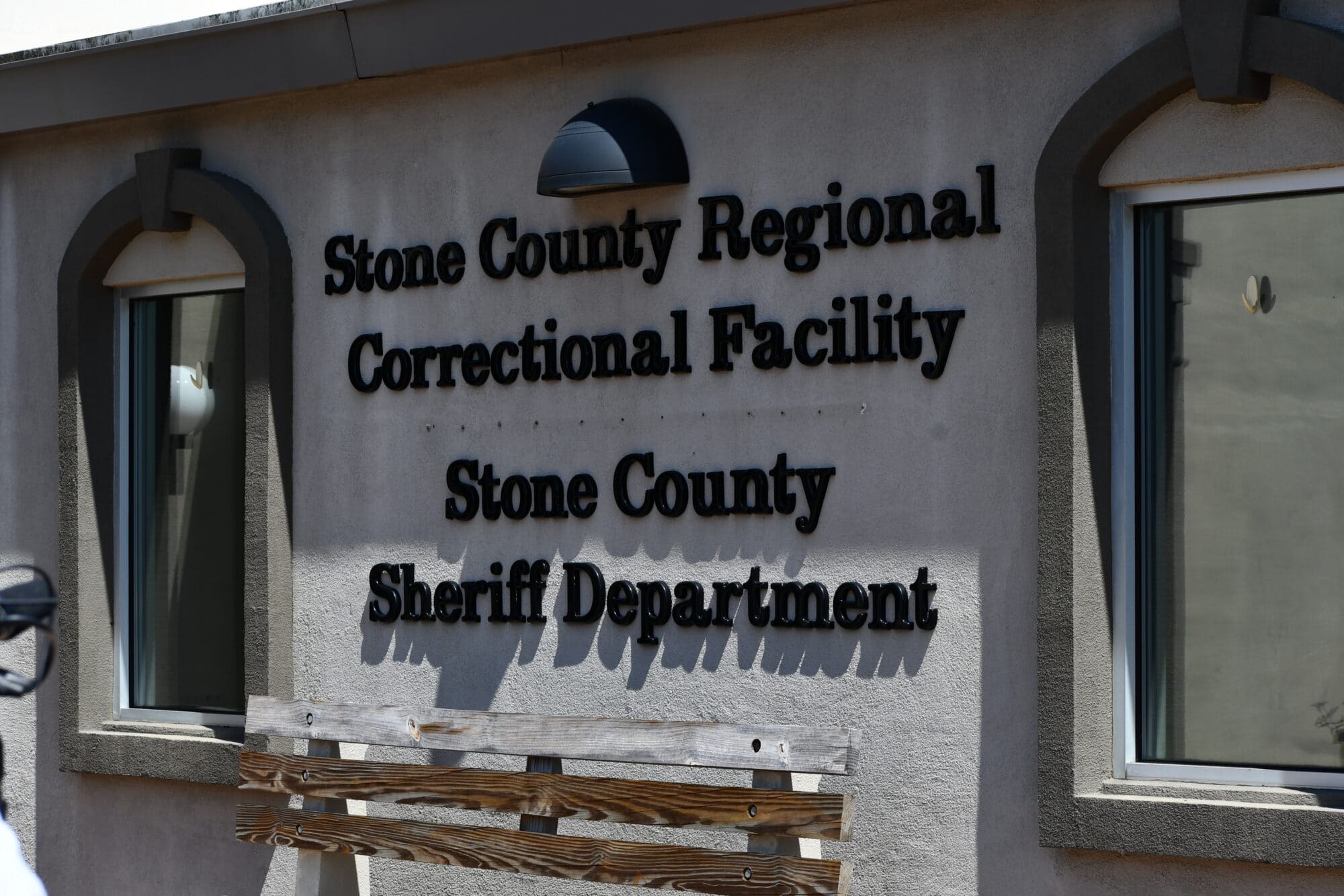 Signage outside the Stone County Correctional Facility that reads “Stone County Regional Correctional Facility" above "Stone County Sheriff Department.